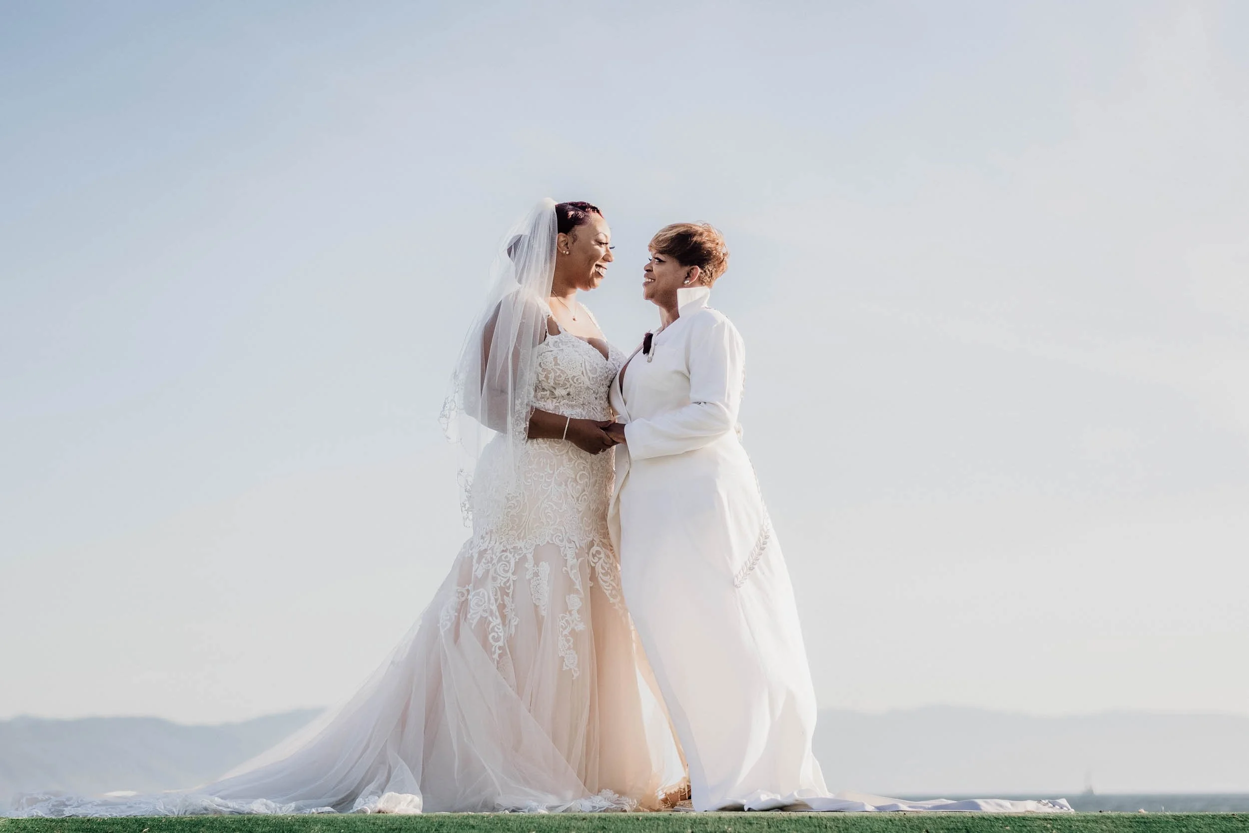 LGBTQ couple after their beach wedding ceremony at the Marriott Resort in Puerto Vallarta Mexico