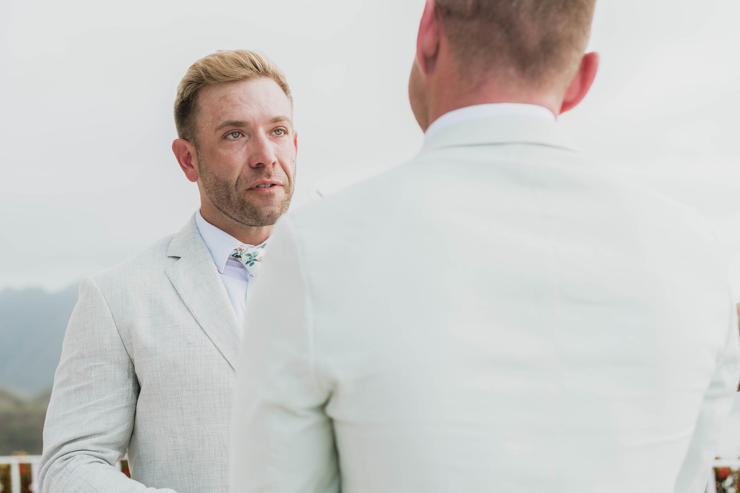 Wedding vows of a gay couple during their destination wedding in Mexico.