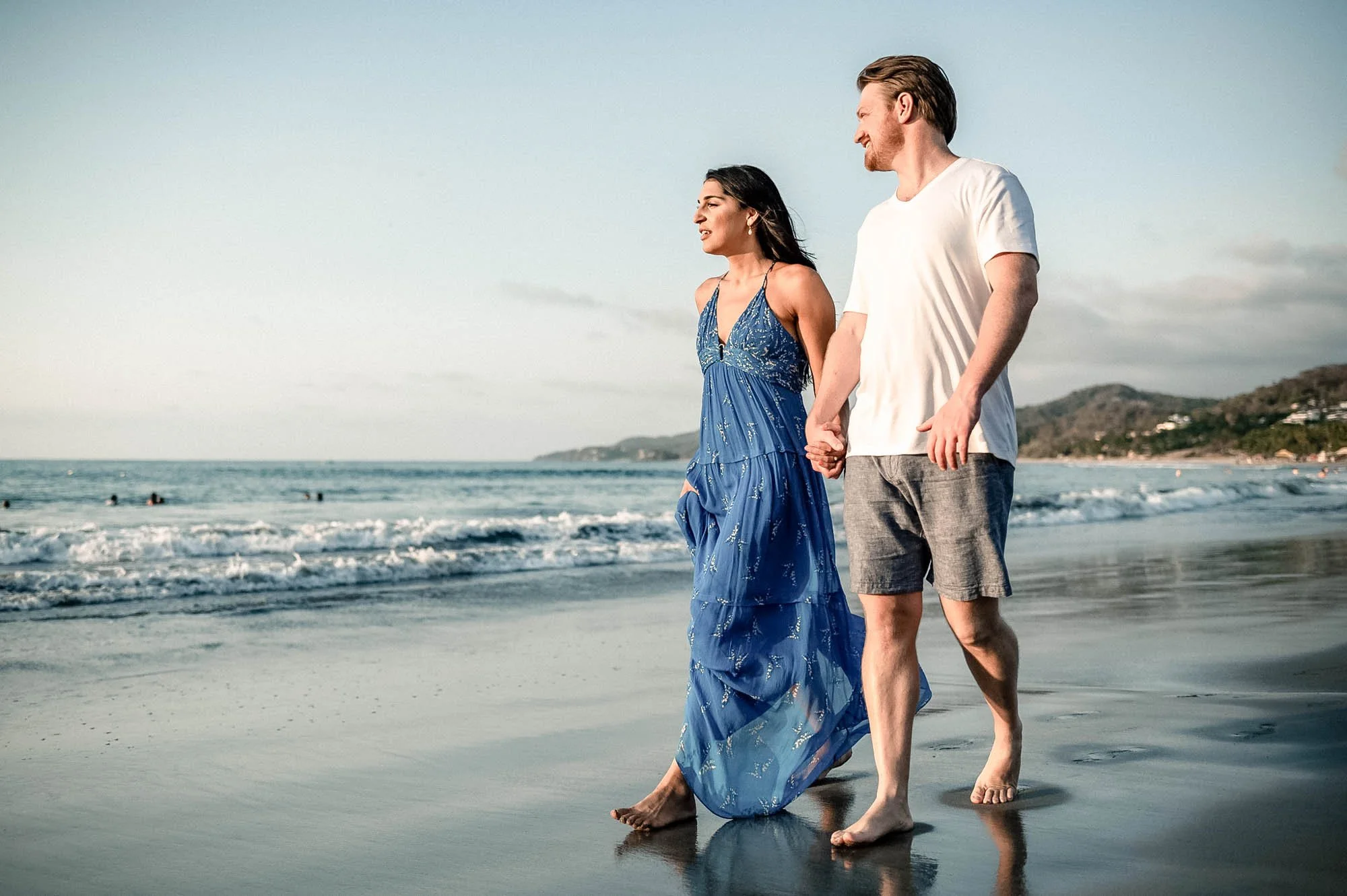 Couple walking along the beach during engagement session in Puerto Vallarta