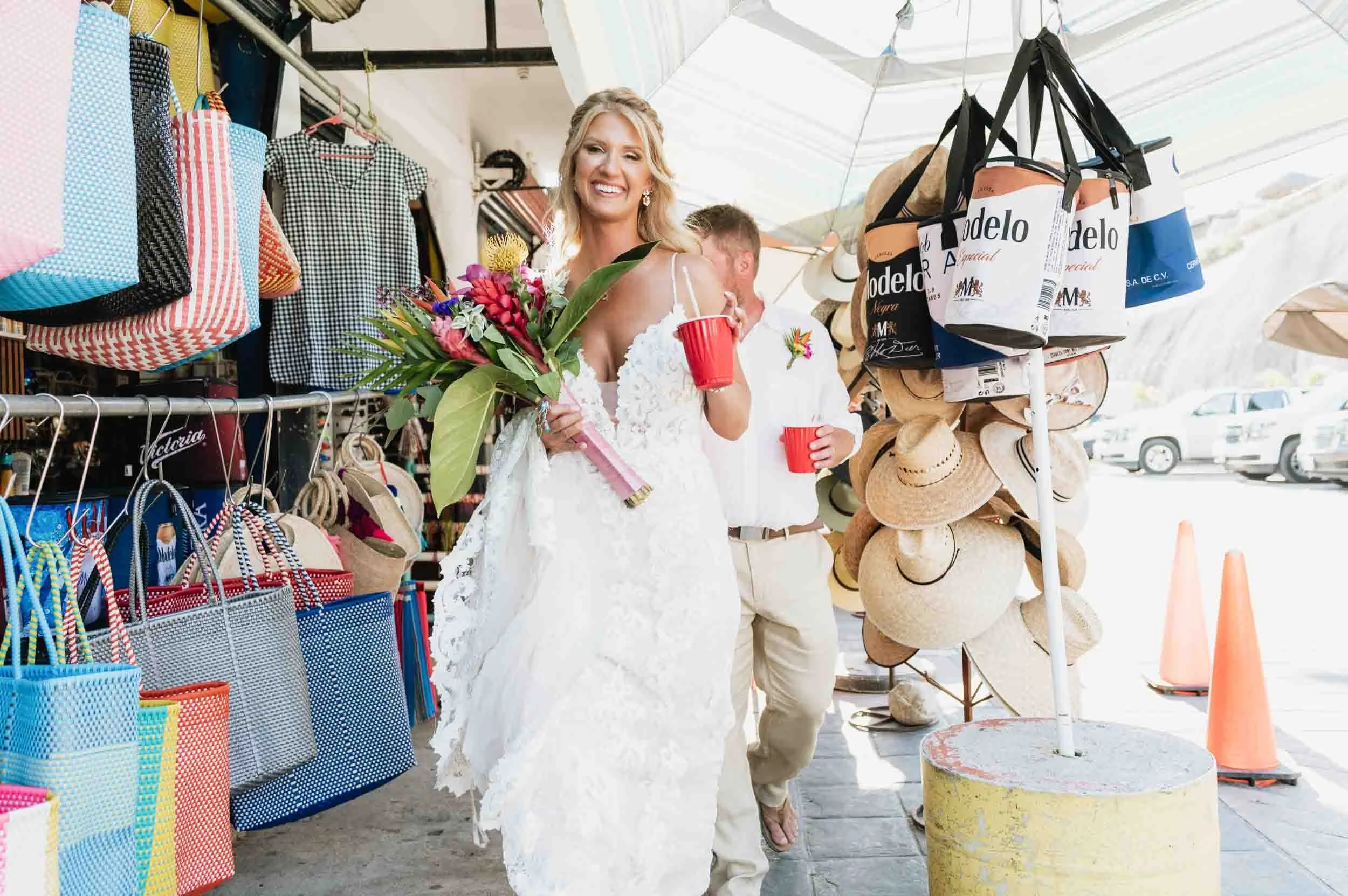 Bride walking on sidewalk after destination wedding in Puerto Vallarta