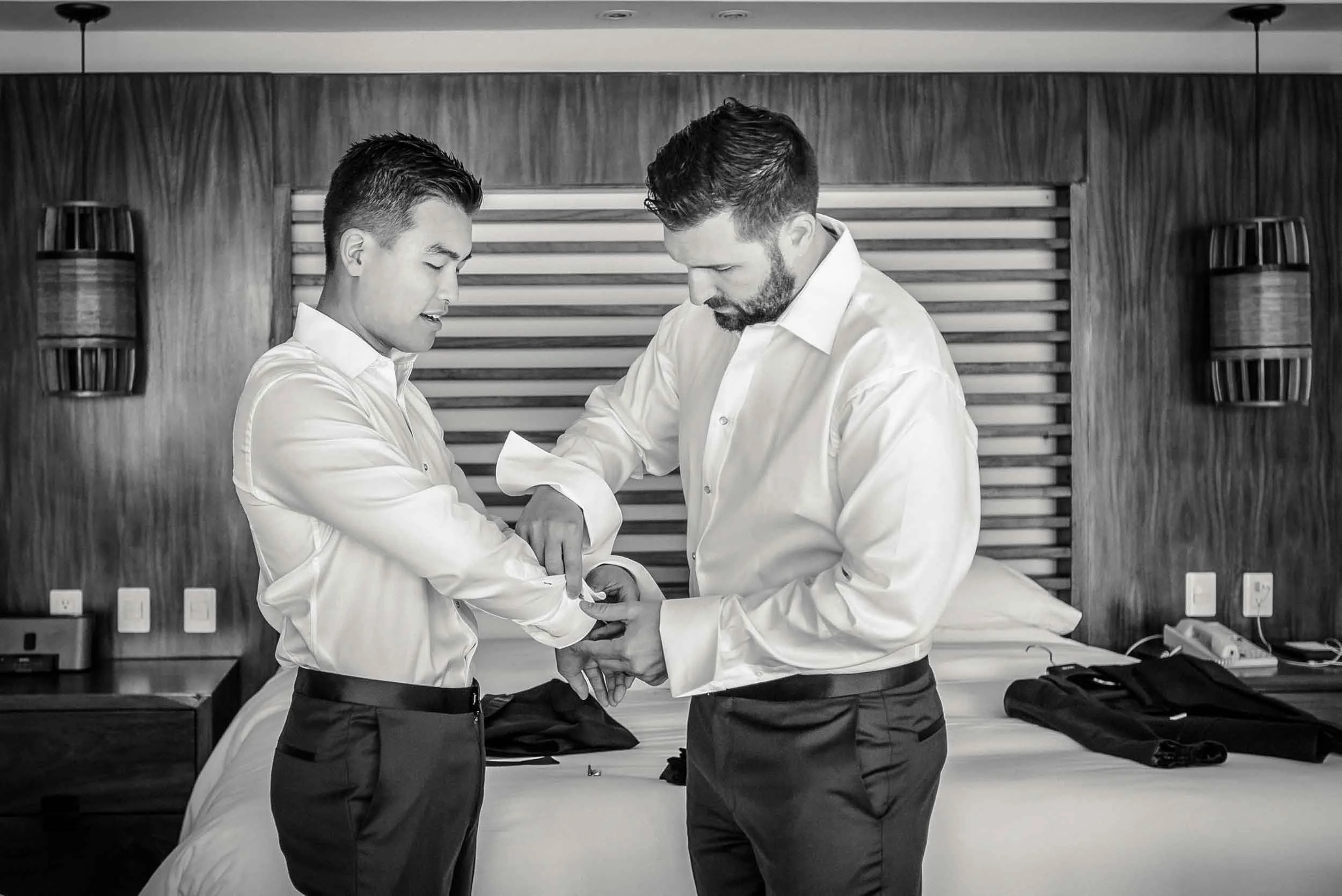 Grooms getting ready before their wedding ceremony.