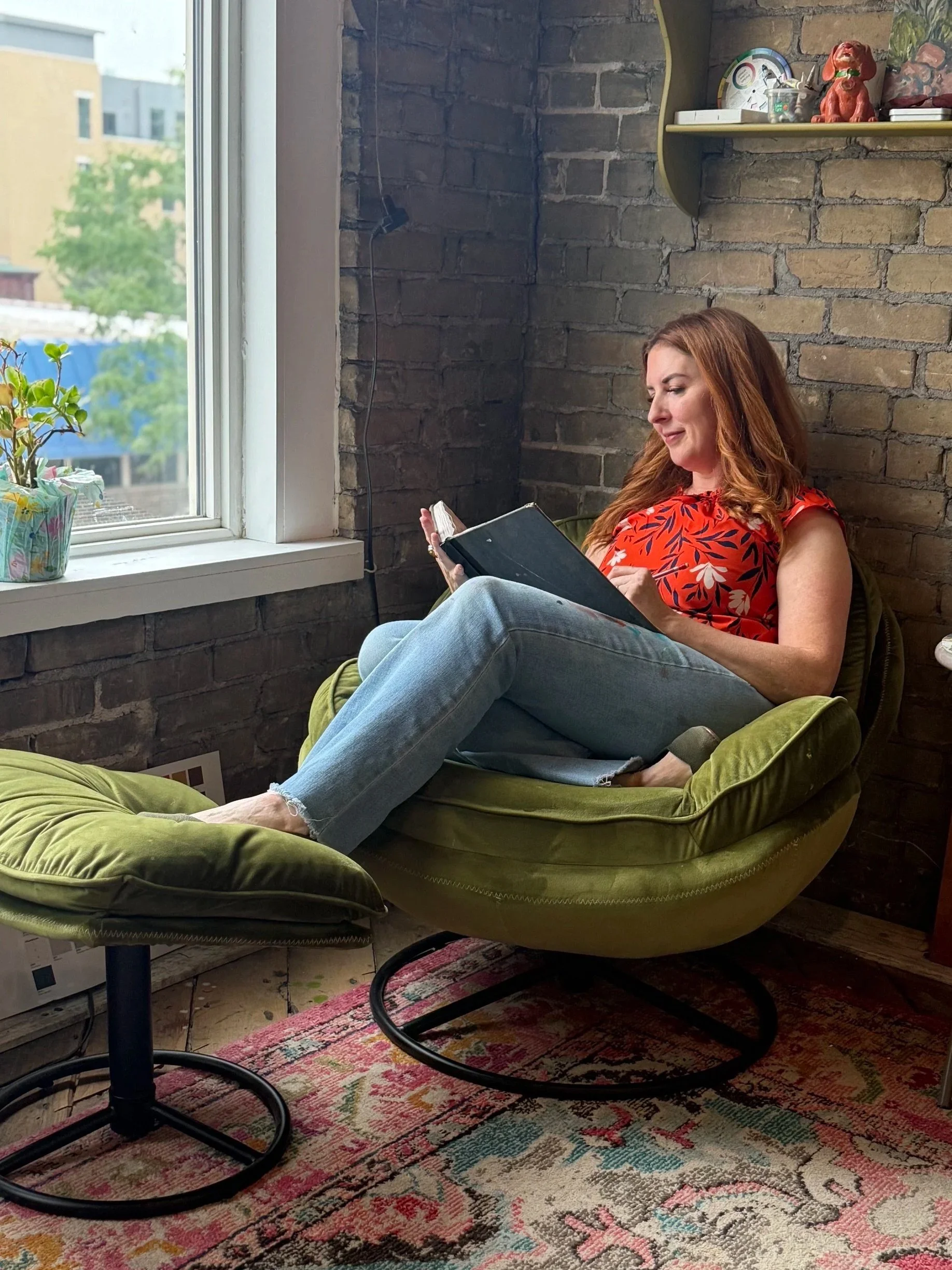 Colleen Drew, founder of Drew Art Inc., muralist and fine artist based in Oconomowoc, WI