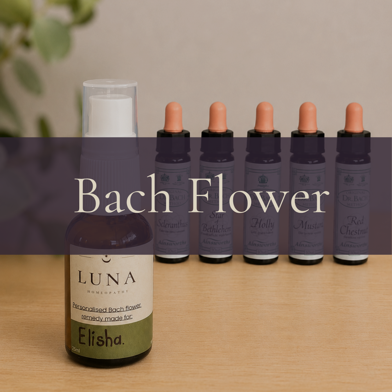 Bach Flower homeopathic remedies on a wooden surface, including a spray bottle labeled Luna, and five small amber bottles with dropper caps, each with labels indicating different flower essences.