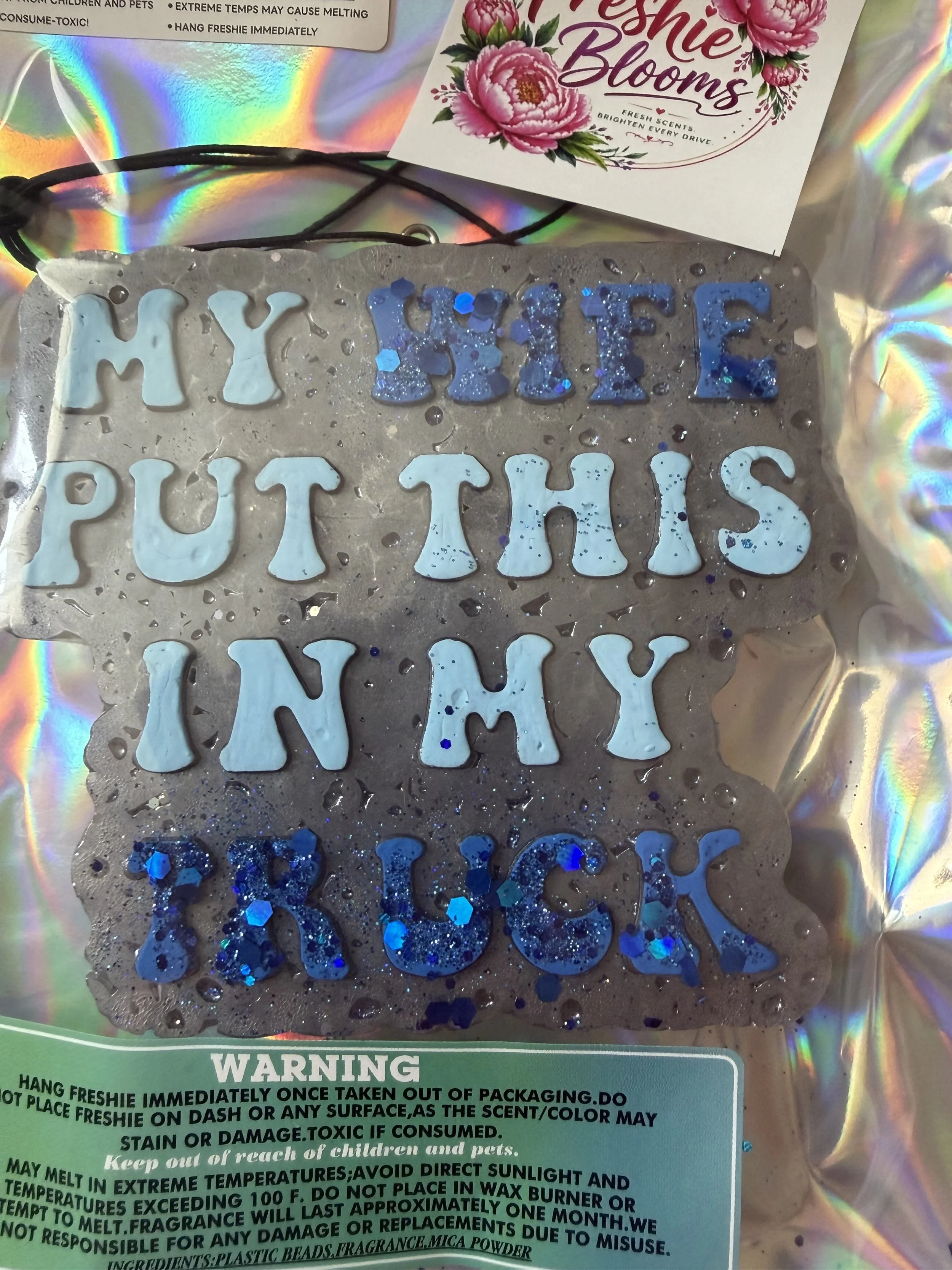 My wife put this in my truck- Sea salt sandal scent