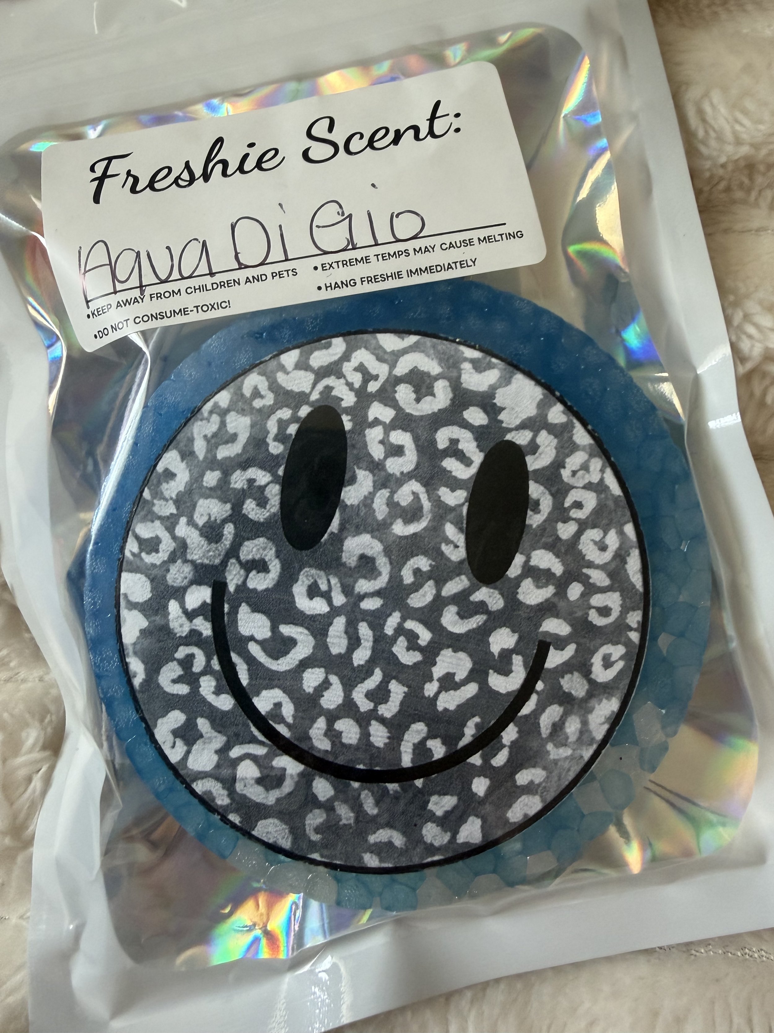 Smiley- Aqua di gio scent