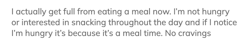 A screenshot of a text message discussing not feeling hungry or craving snacks after a meal.