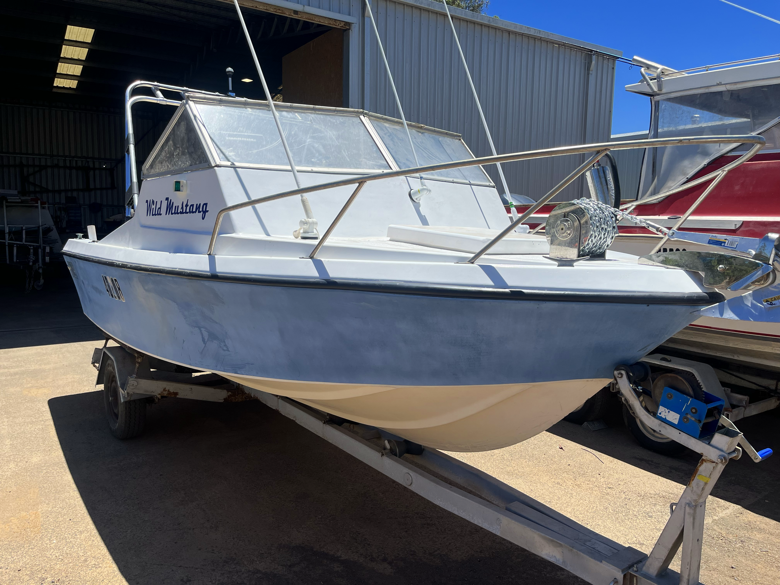 After Cabin Extension: Helm (cuddy cab) raised to offer better protection