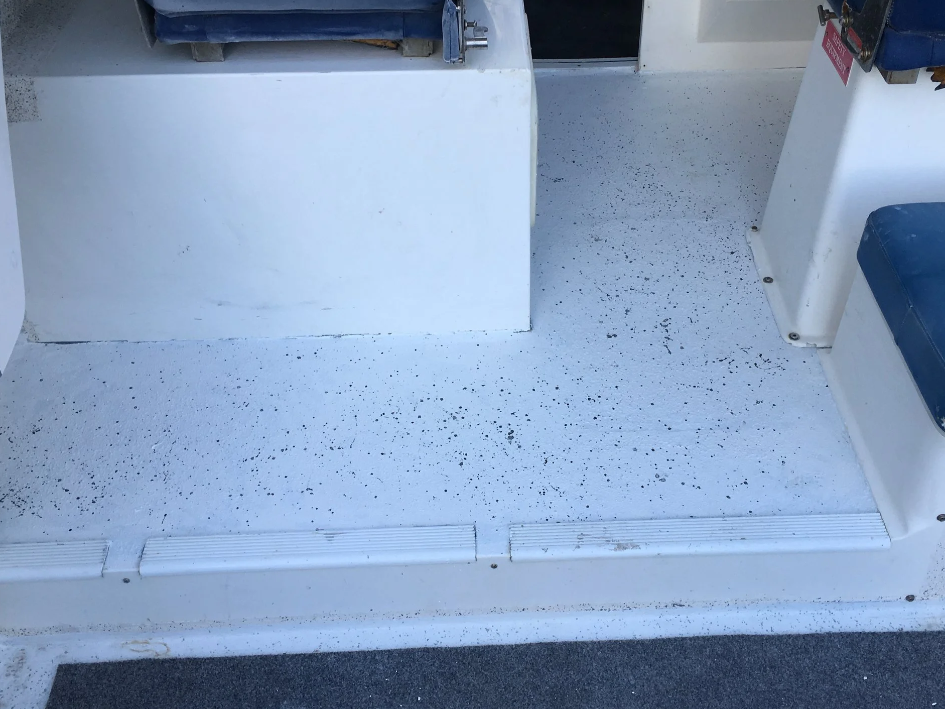After Fibreglass Repair: Old hatch filled in and levelled out, speckle-finish flow coat applied to whole deck