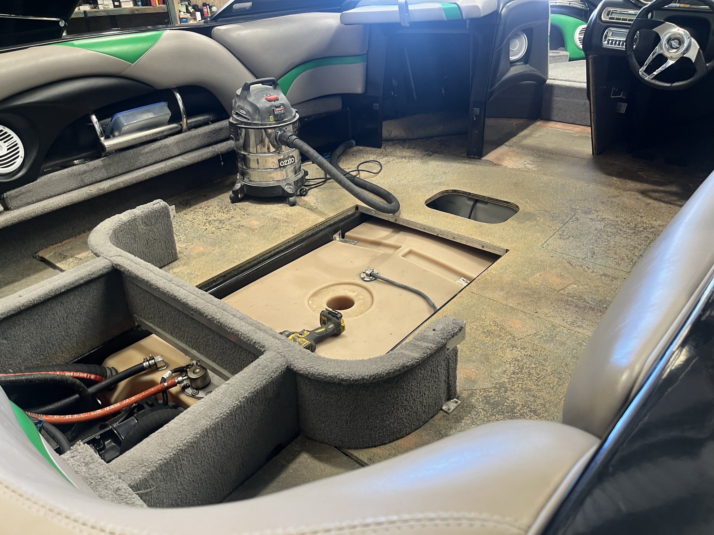 Before: Removed old carpet from wake boat