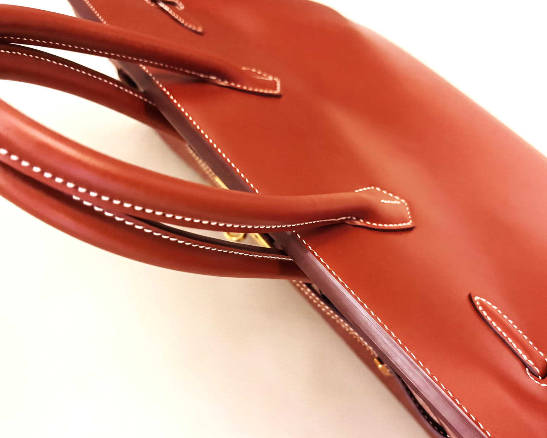 Luxury+Handbag+Stitching+Detail.png