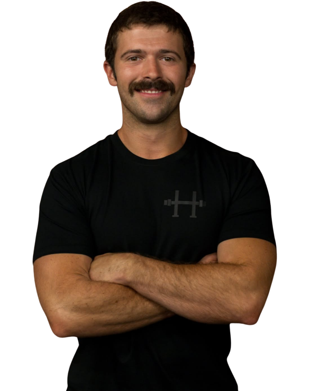 A man with a mustache and short dark hair, smiling with arms crossed, wearing a black t-shirt with a small logo on the chest.