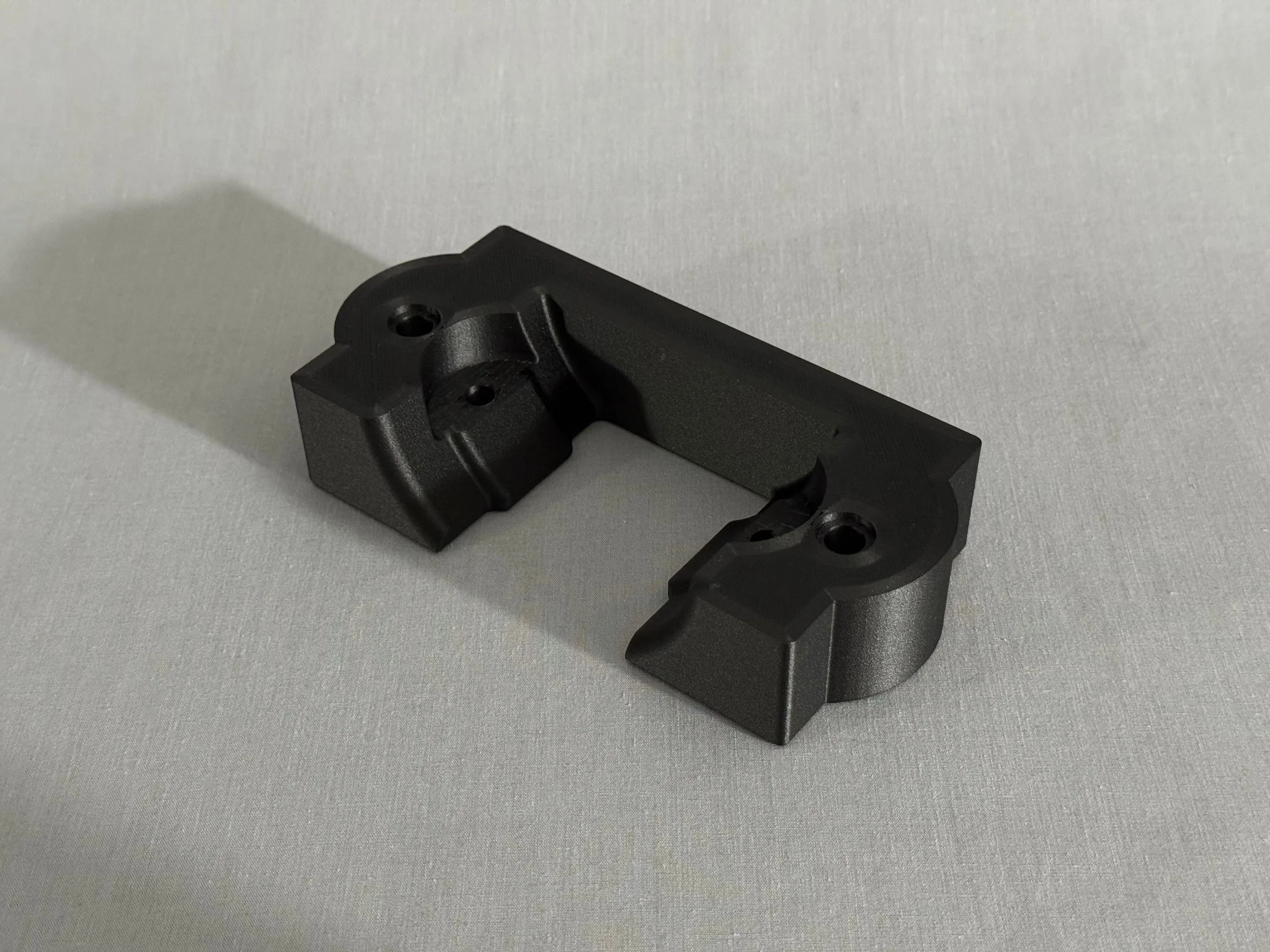 Heavy-duty continuous fiber end-use nylon component.