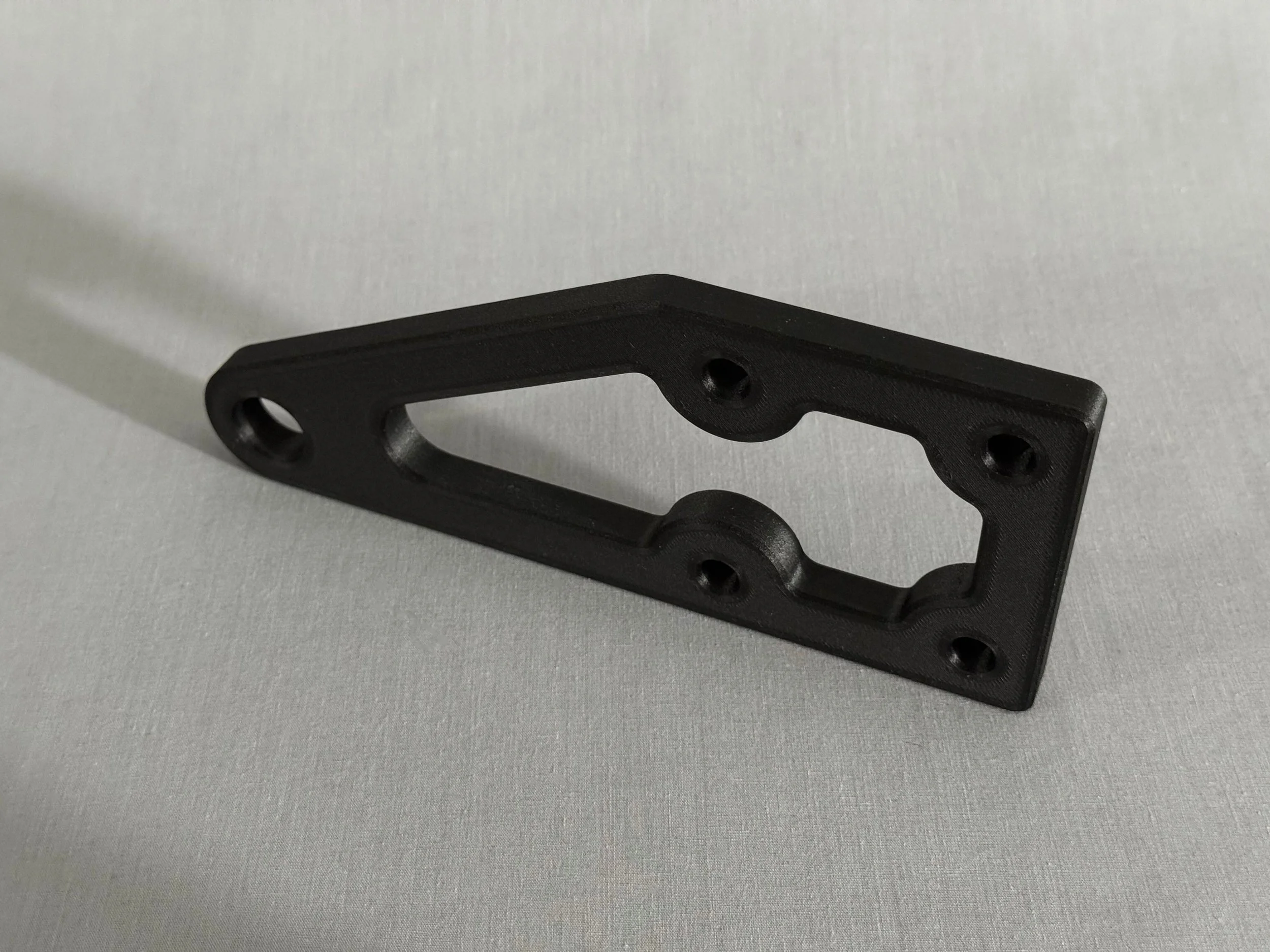 High-strength composite 3D printed manufacturing fixture.