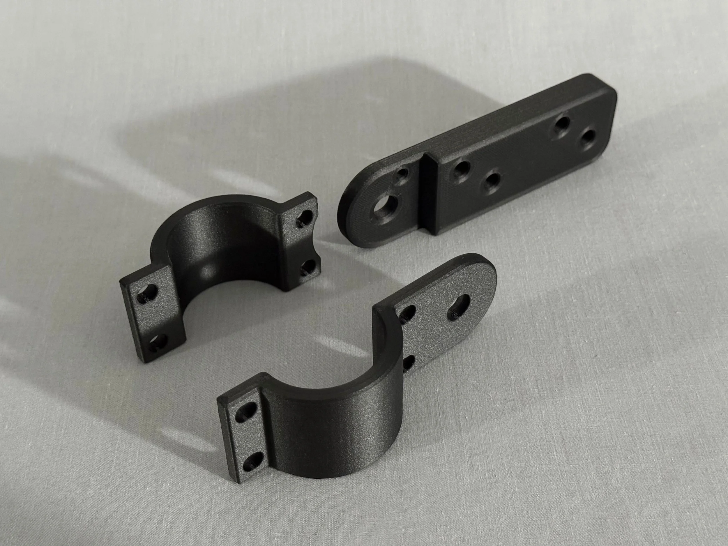 Industrial-grade Onyx micro carbon fiber filled nylon 3D printing replacing machined metal.