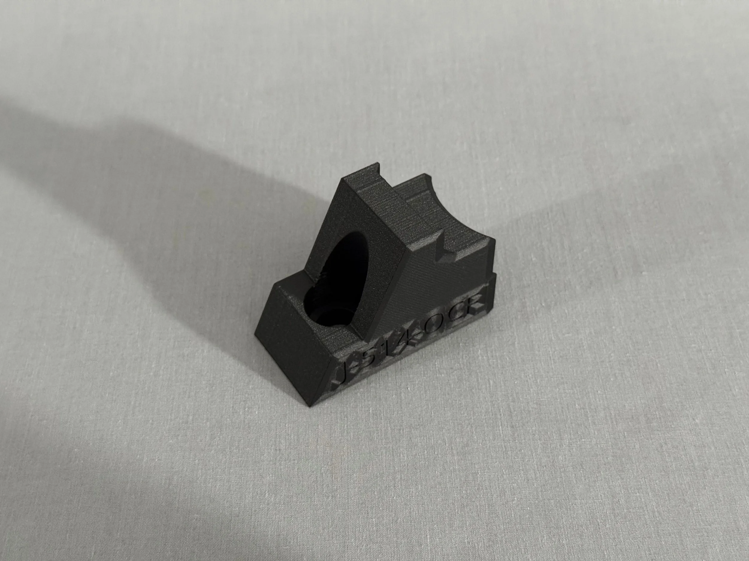 Onyx micro carbon fiber filled nylon with continuous Kevlar fiber inlay.
