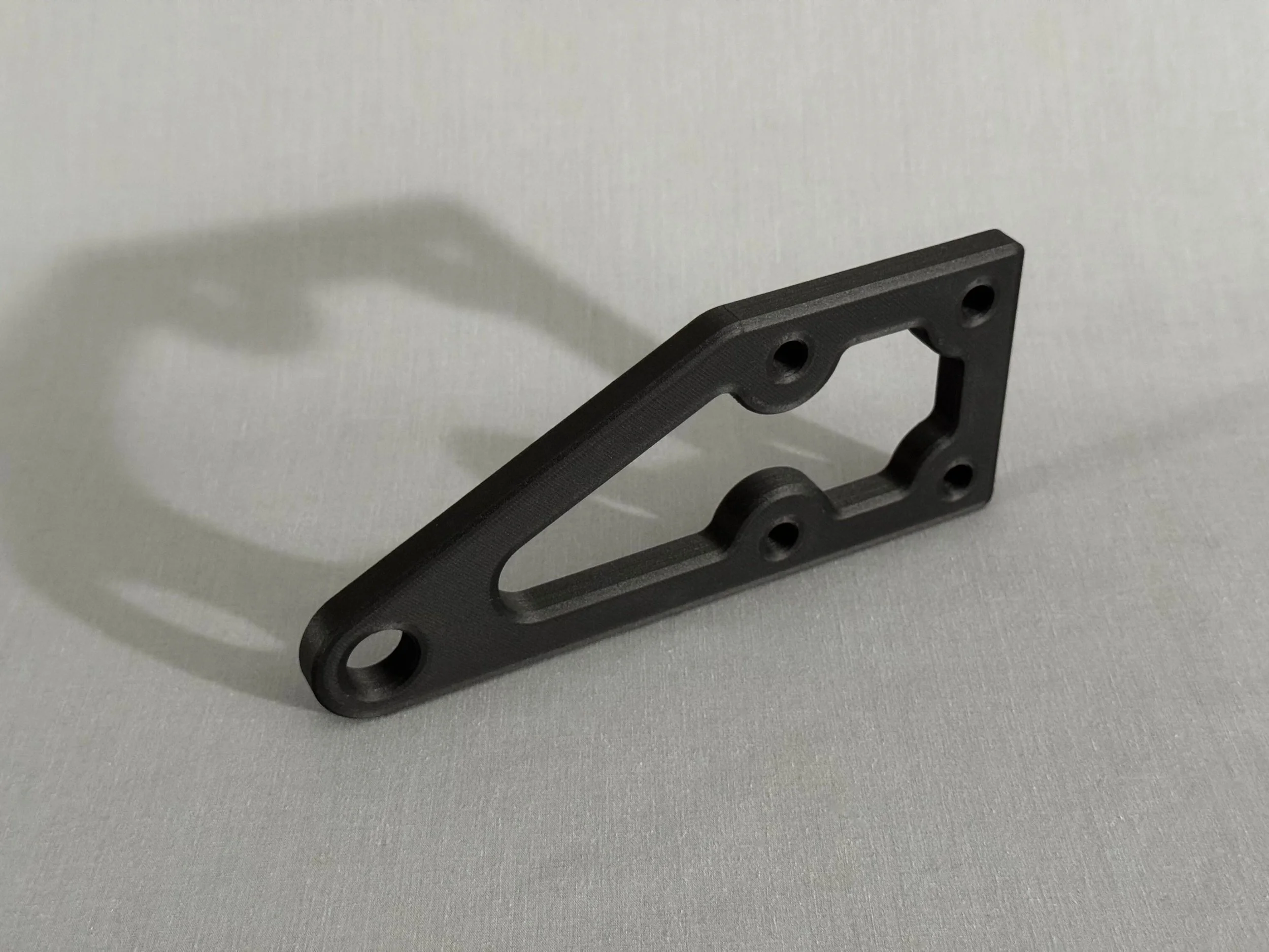 Continuous carbon fiber reinforced mechanical bracket.