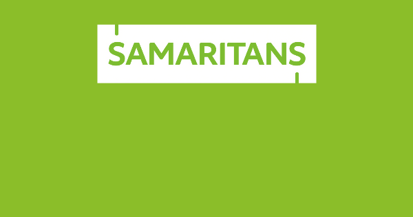 Green background with white rectangular box containing the word 'SAMARITANS' in green text.