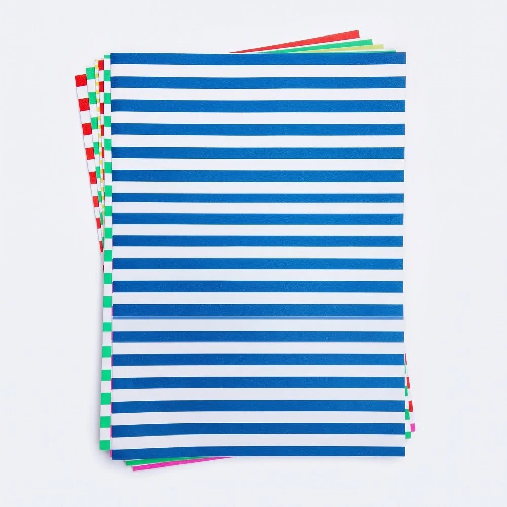 fogli carta regalo a strisce blu e bianche.jpg