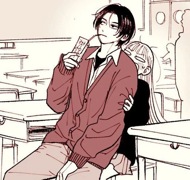 Anime-style drawing of a young man with black hair, wearing a red jacket and drinking from a juice box in a classroom, with a girl sitting behind him smiling.