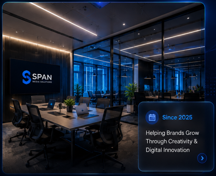 Modern conference room with a large table, black chairs, laptop computers, and potted plants, illuminated with blue and white lighting. A wall-mounted screen displays the logo 'SPN Media Solutions,' and a digital overlay indicates the company has been helping brands grow since 2025 through creativity and digital innovation.