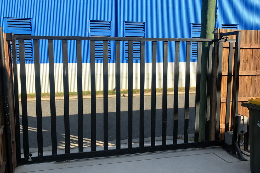 Custom automatic sliding gate installed by Jeno's Electrics