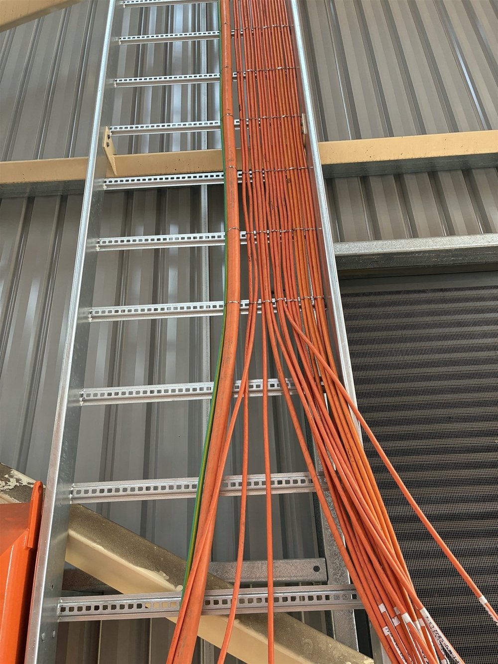 Cable ladder and power cable run in a commercial shed