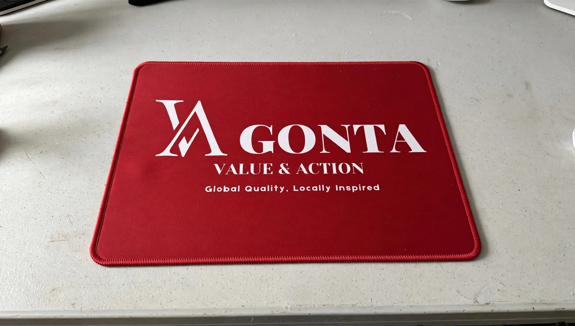 red_mouse_pad_desk.webp