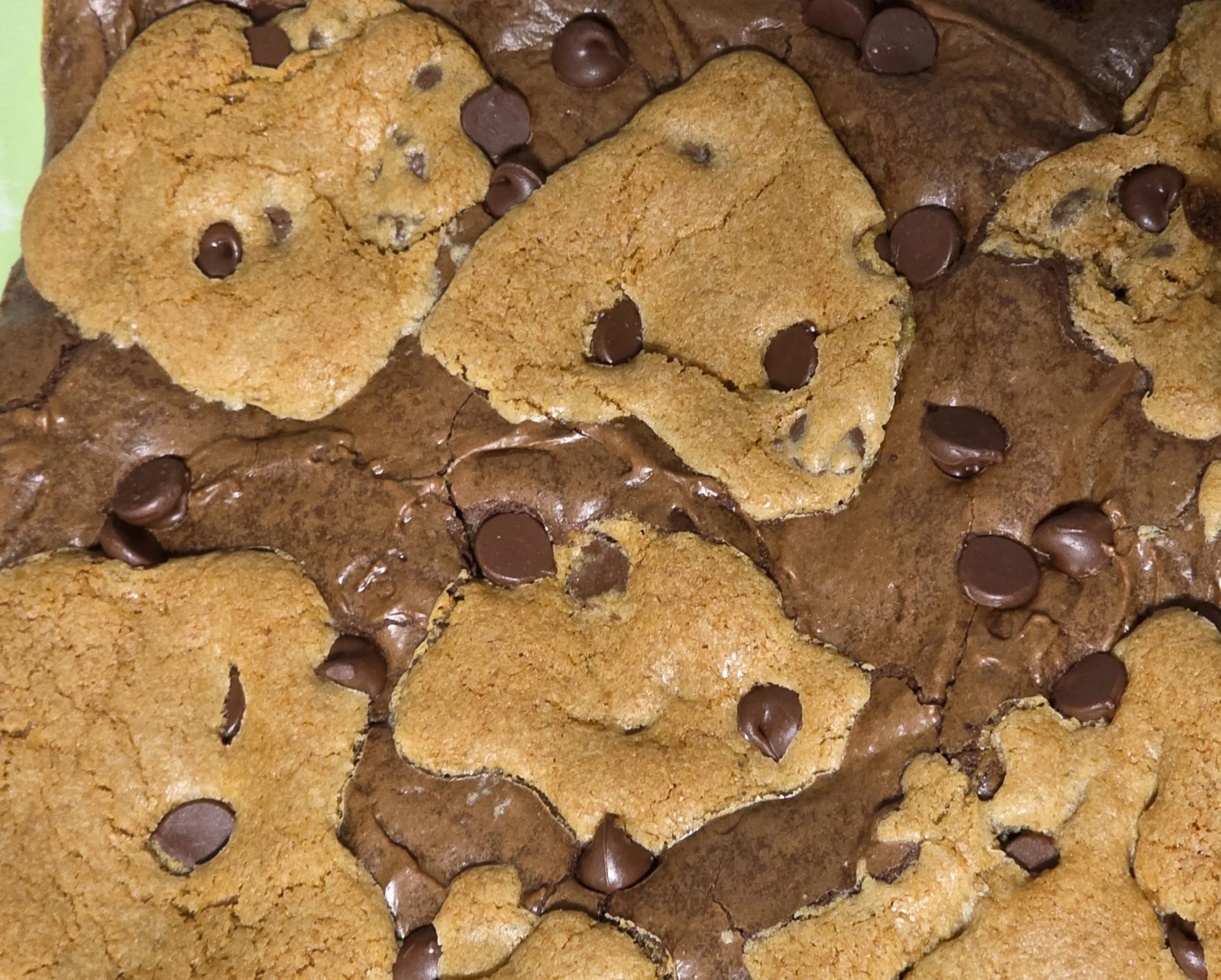 Close-up of chocolate chip cookies and a brownie