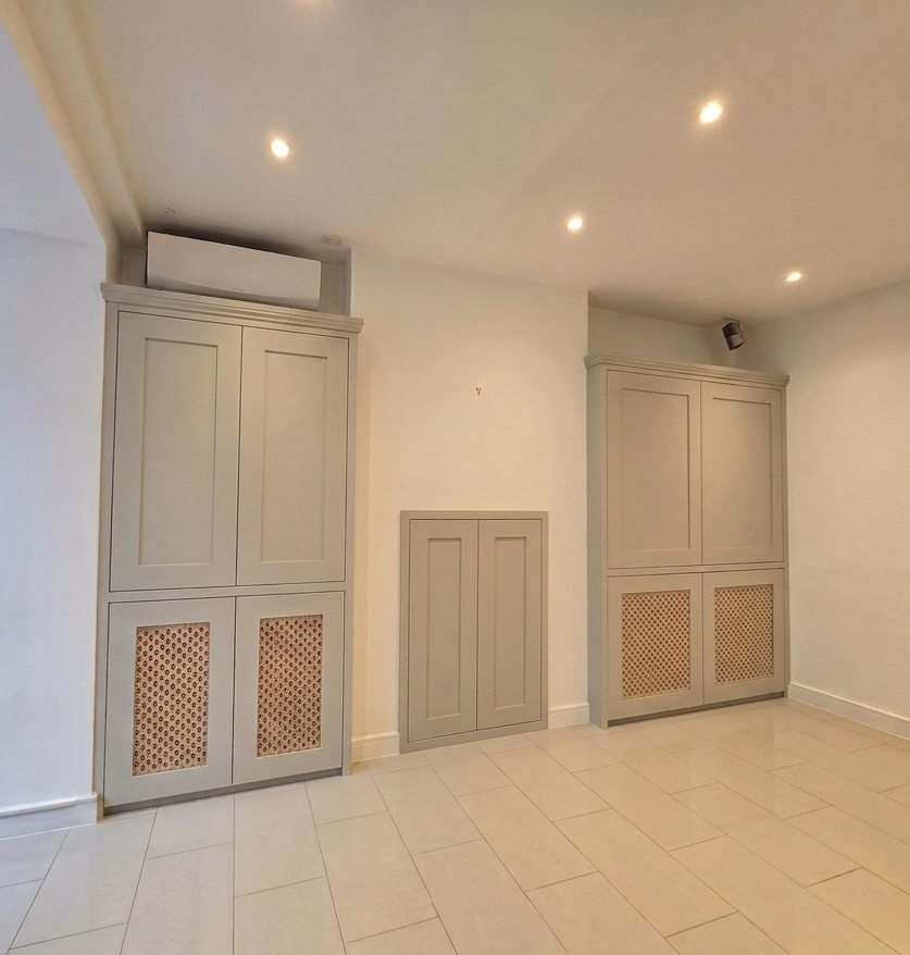 Bespoke lounge  cupboards radiator covers