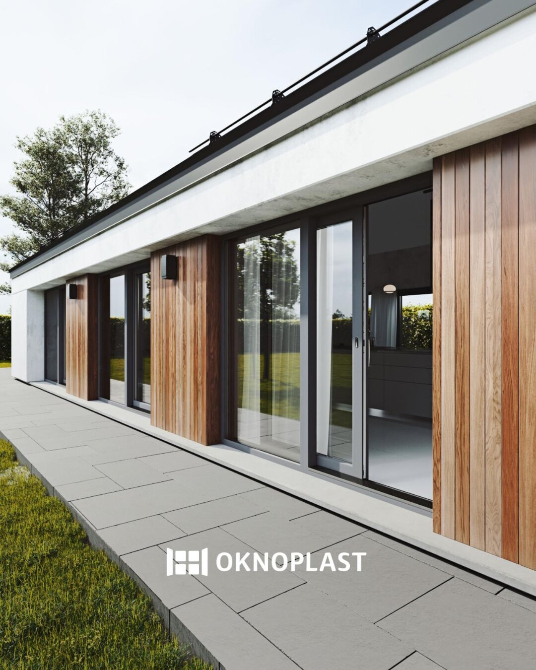 Baies coulissantes PVC gris anthracite Oknoplast sur maison moderne — pose de coulissants dans le Pays de Fayence