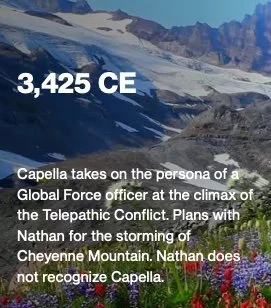 Snow-covered mountains with colorful wildflowers in the foreground, blue sky with clouds.