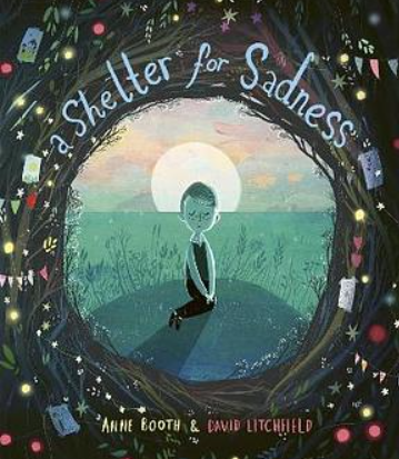 Book cover titled 'a shelter for Sadness' featuring a child sitting inside a circular frame with a natural landscape and sunset background, surrounded by colorful objects.