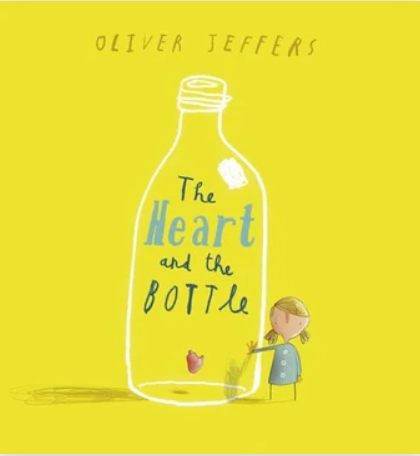 Cover of a book titled 'The Heart and the Bottle' by Oliver Jeffers, featuring an illustration of a girl holding a large bottle with a heart inside, on a yellow background.