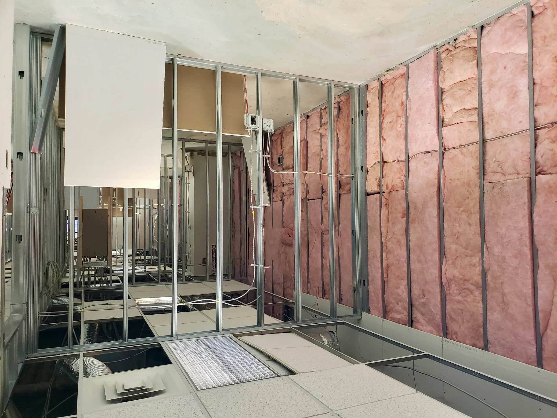 Insulation installation in progress.