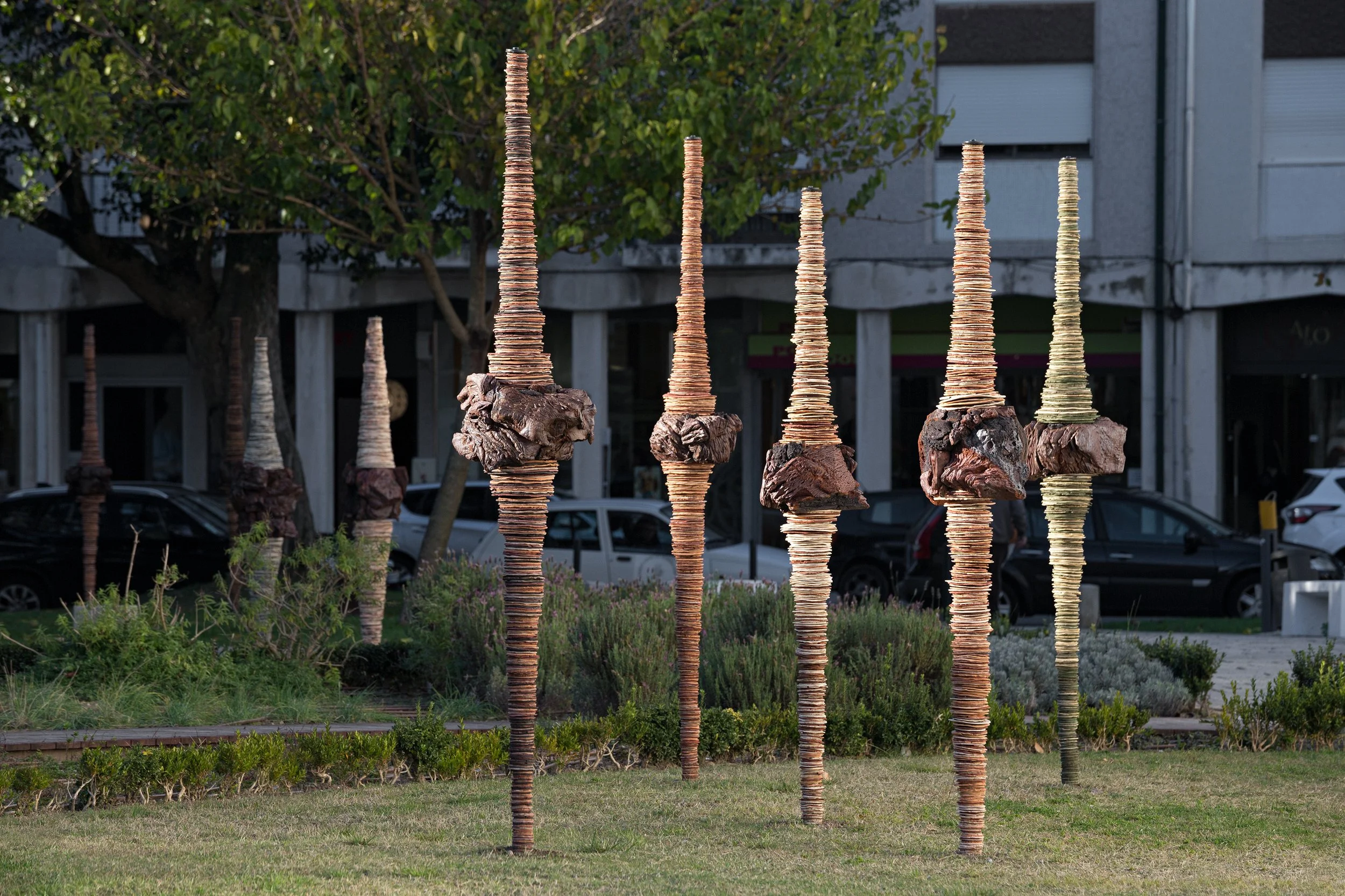 Pigmented clay and expanded slate fired at 1200ºC. 11 sculptures average 190 x 50 (cm) each