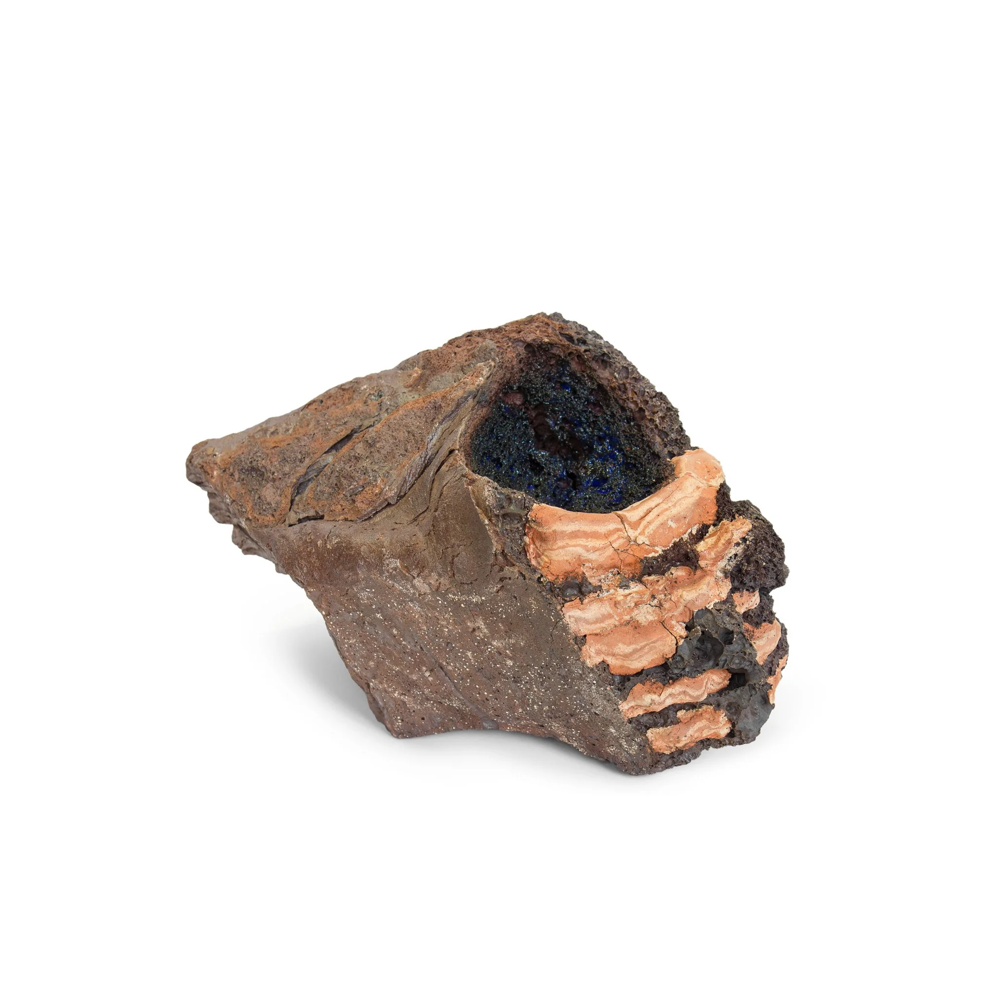 Pigmented stoneware clay, oxides, engobes and glazes on an sculpted expanded slate stone, over multiple firerings at 1260ºC. 19,5 x 26,5 x 20 (cm)