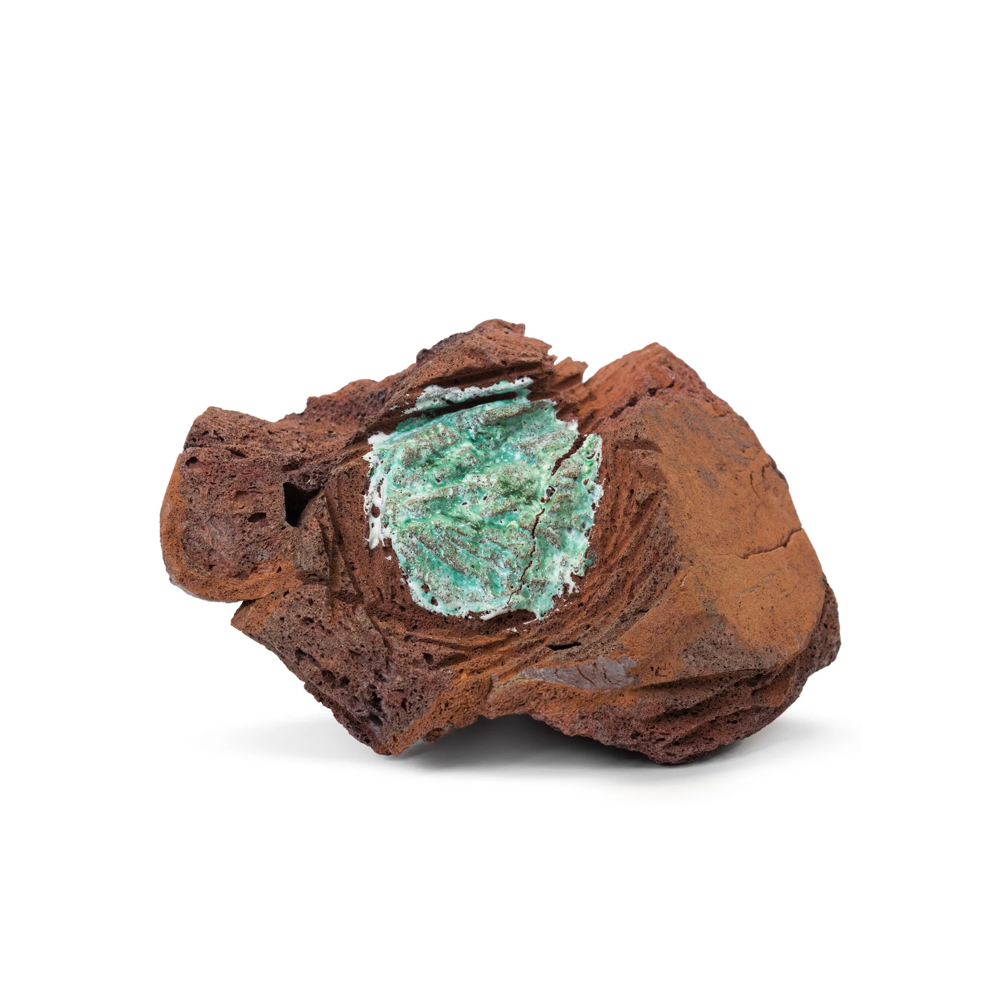 Oxides, engobes and glazes on an sculpted expanded slate stone, over multiple firerings at 1260ºC. 26 x 25 x 14,5 (cm)