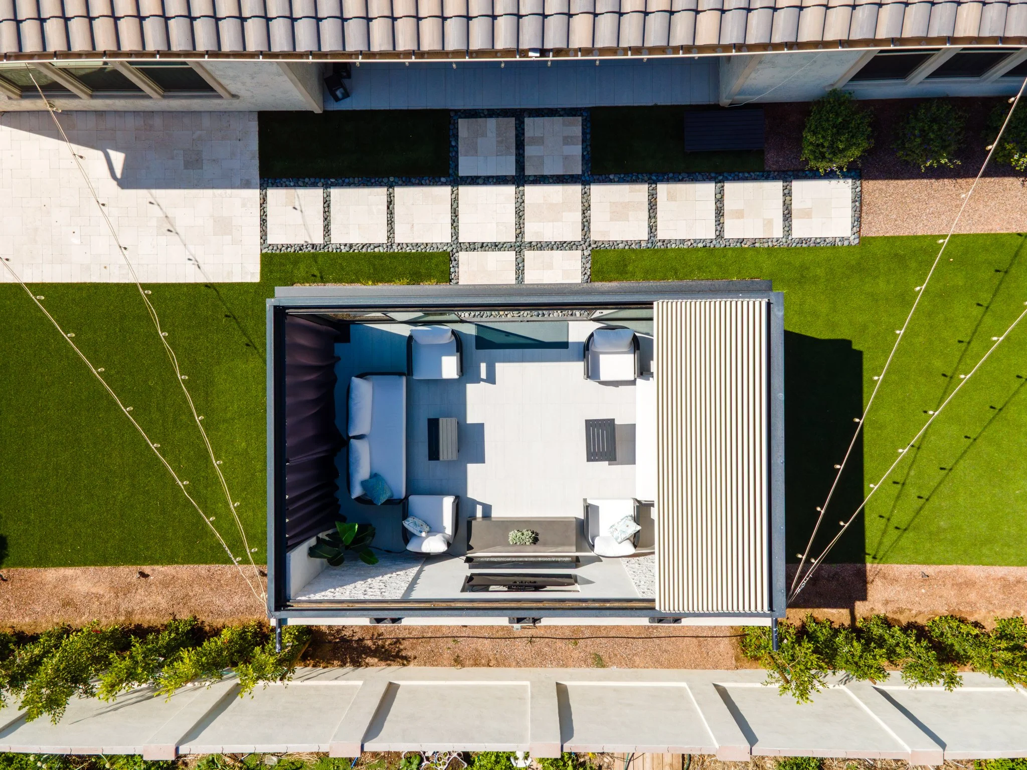 aerial-view-modern-adaptive-patio-with-tilting-louver-roof-system.jpg.jpg