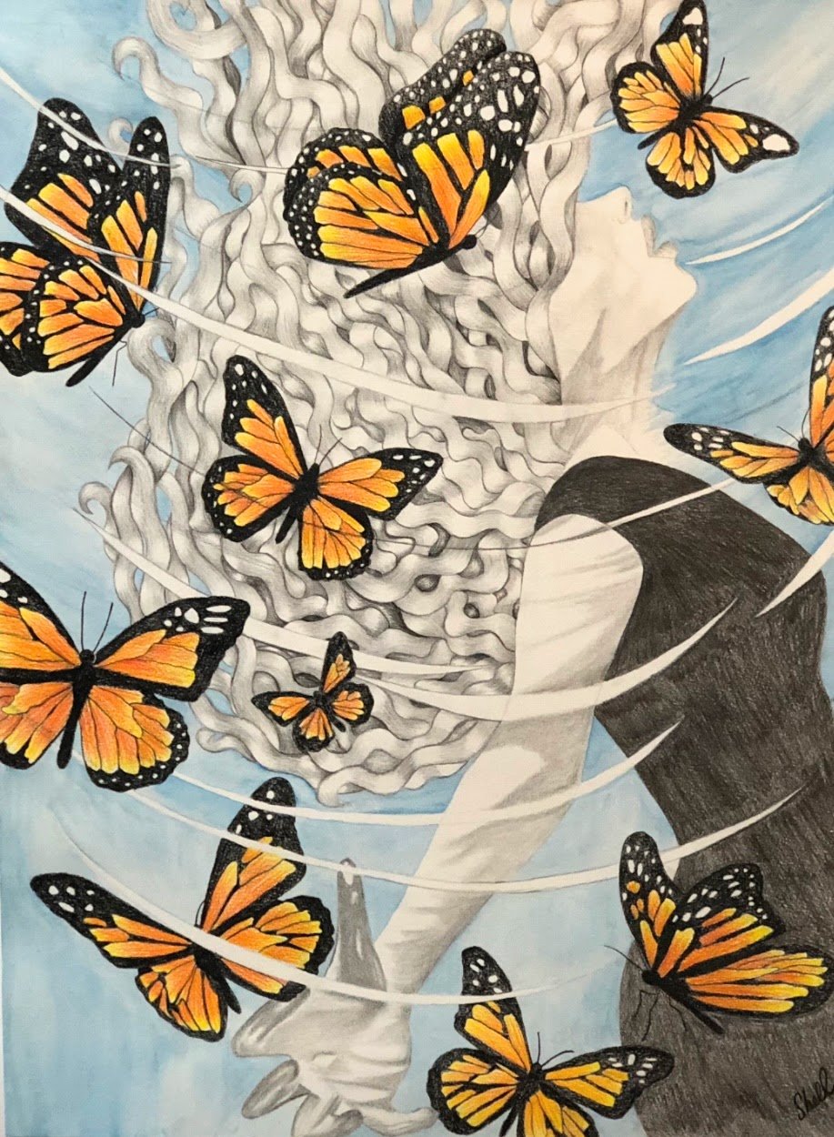 A girl with long curly hair is surrounded by orange and black monarch butterflies, some of which are flying around her and others appear to be resting on her hair.