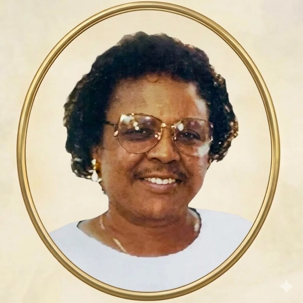 Wiillie Mae Moye (Sliim) with short curly hair, wearing glasses, earrings, and a necklace, appears in a vintage-style gold oval frame against a light background.