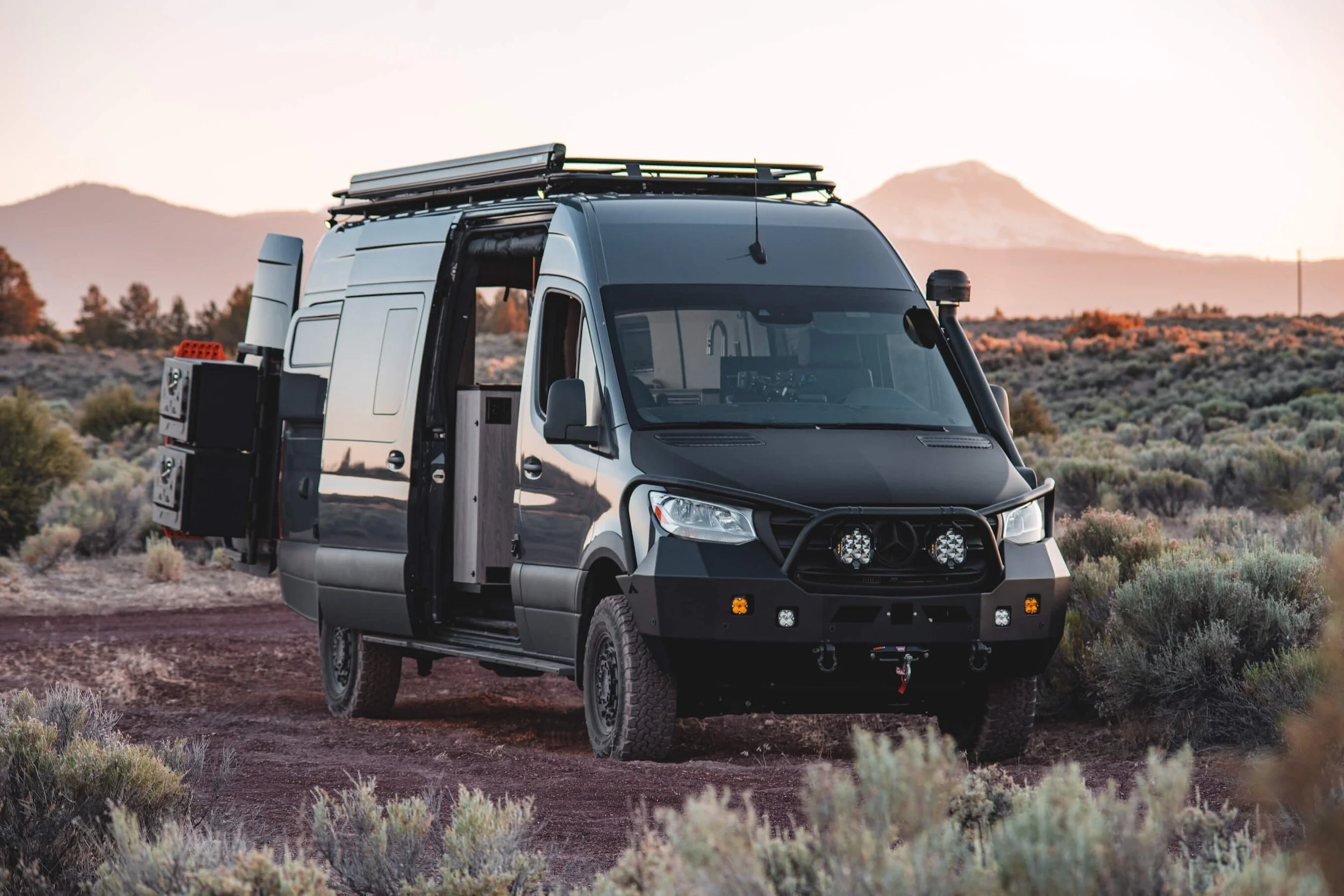 Sprinter 4x4 170 custom build with aluminess bumper and warn winch, owl accessory boxes, hood wrap and Baja lighting package