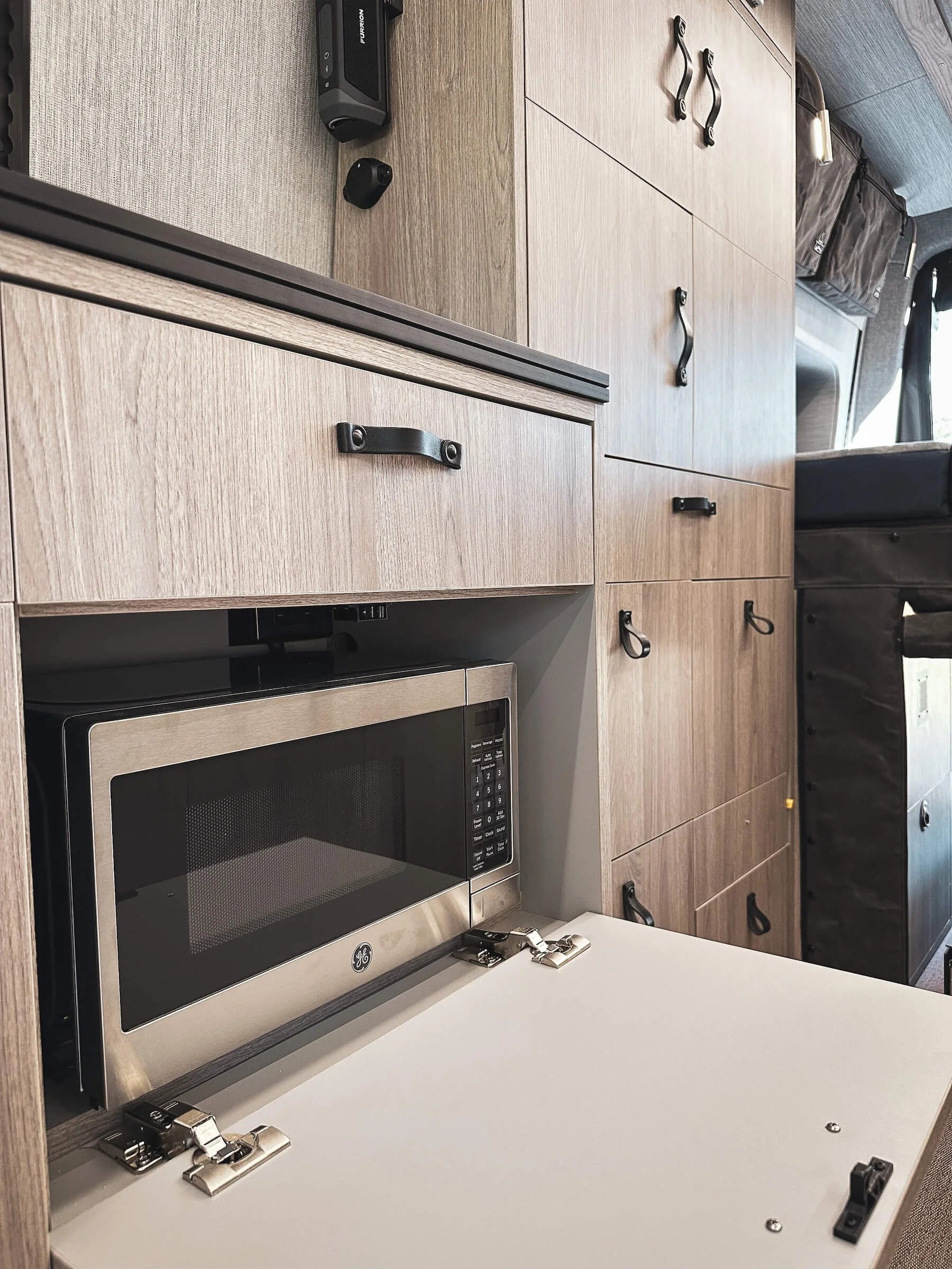 Fold Down Microwave Cabinet Door in Custom Built Sprinter Van