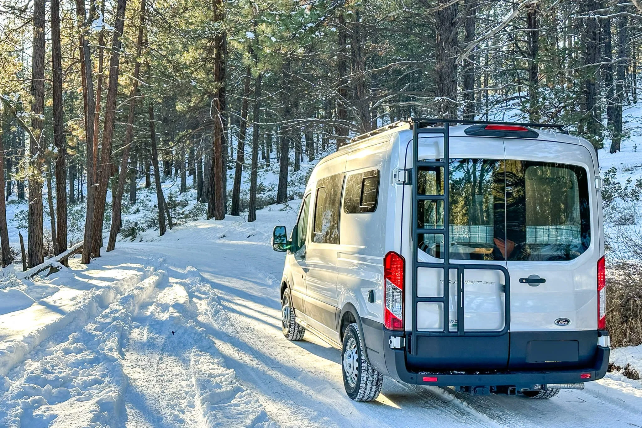 Ford Transit 130 Van Conversion with aluminess rack and Ama windows
