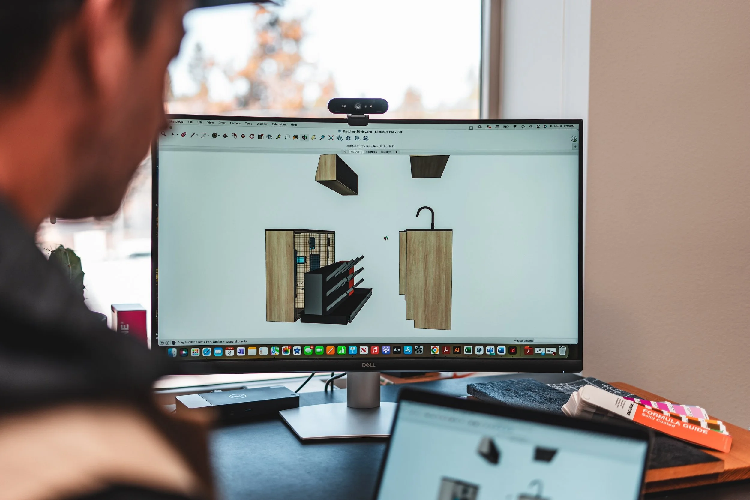 Featuring Ed working on a custom van cabinet layout on a digital 3D cabinet rendering software.