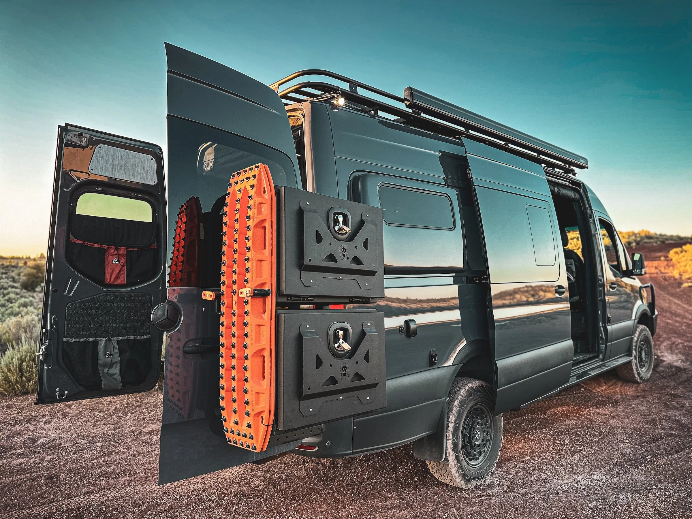 A sprinter 170 sprinter van with maxtrax and owl vans Expedition boxes. Image taken in central Oregon.