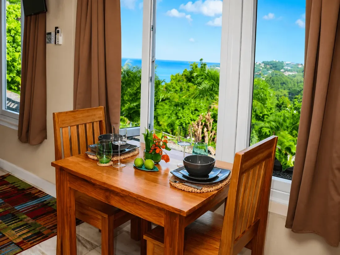 Table for two set for a meal, overlooking the ocean in Saint Lucia