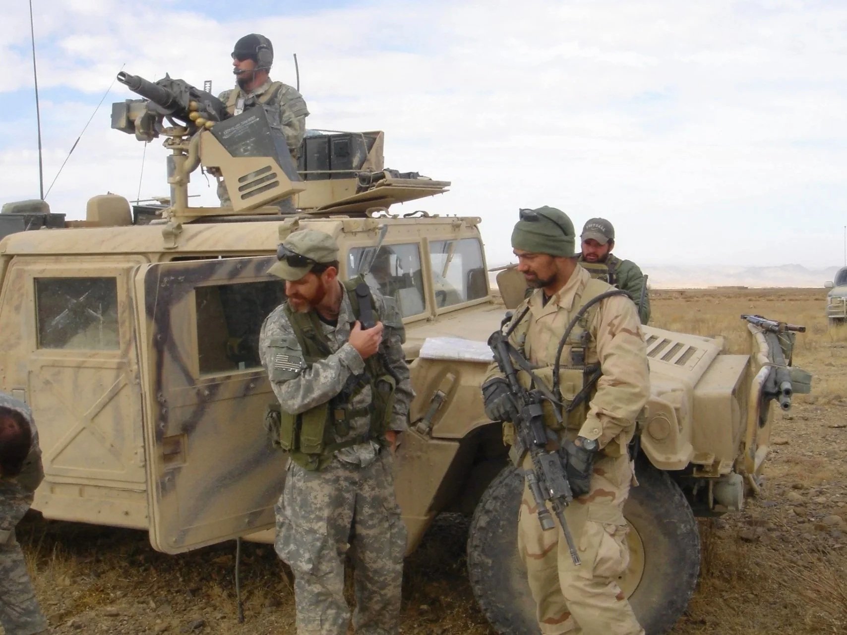 Robb Milheim, front right, stepping off on a dismounted patrol in Afghanistan — the environment where tactical shooting skills are what keeps you alive