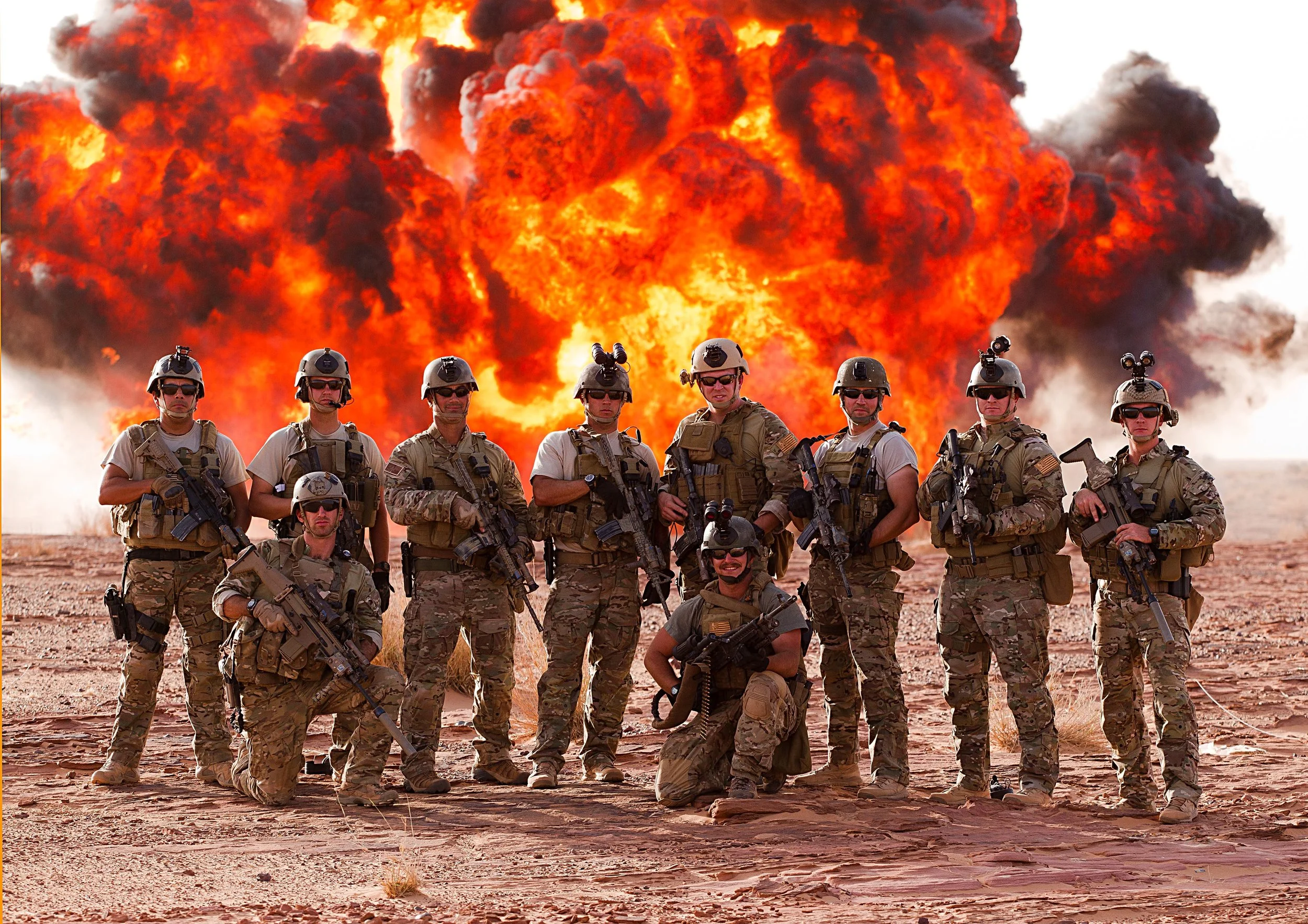 Robb Milheim with his Special Forces team in front of an explosion during a deployment to Africa