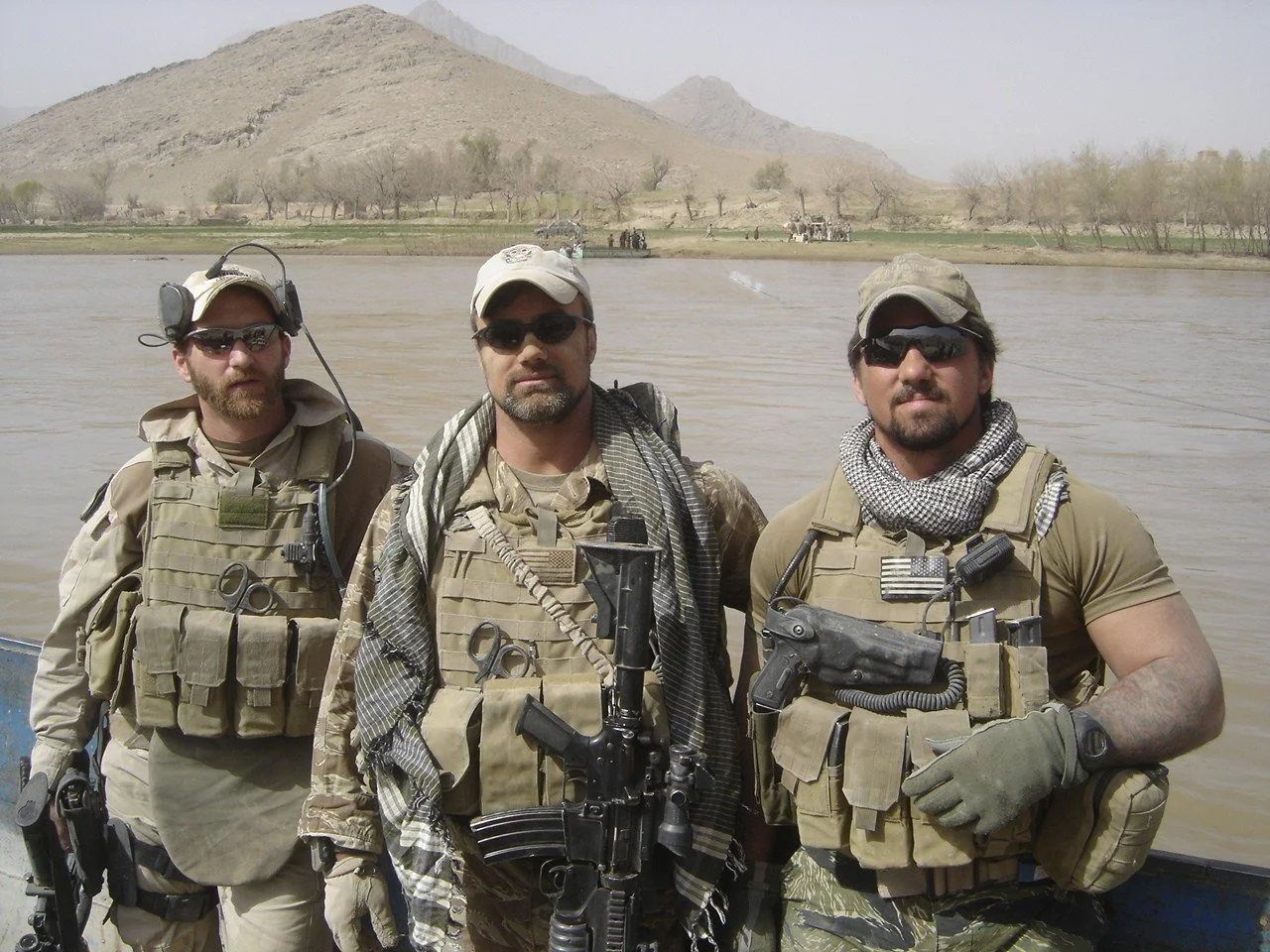 Robb Milheim, center, with Special Forces teammates on combat deployment in Afghanistan
