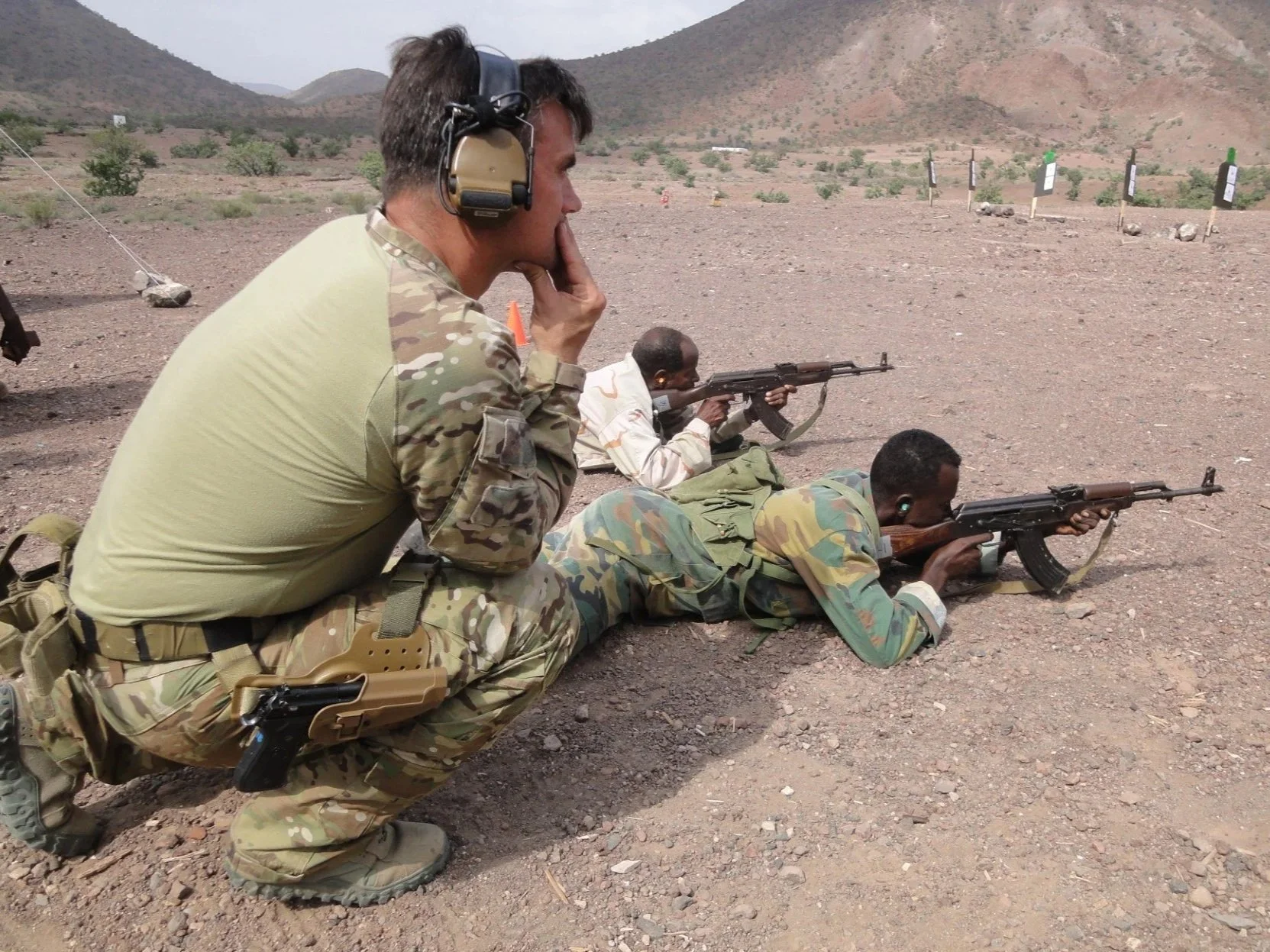 Robb Milheim coaching shooters through prone carbine drills — the instruction style behind SFPT's Intro to Carbine course